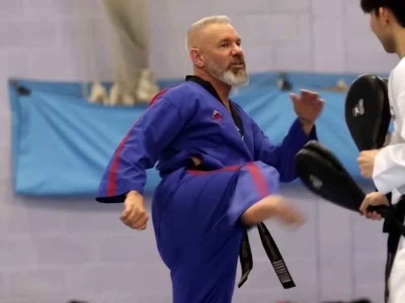 ATI Martial Arts founder Rodney Lockyer practicing a kick with a student.